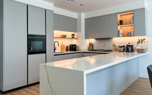Modern Grey Kitchen with Waterfall Island